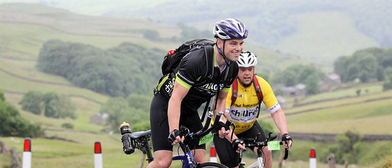 Andy Ridout and Paul Merton cycling the Tour de Yorkshire