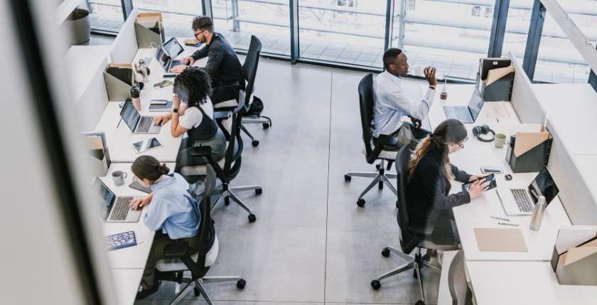 Office workers sitting at their desk