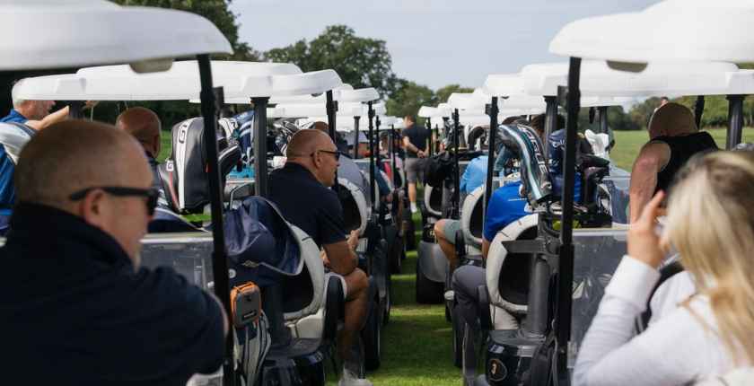 Blog headers website (15) Golf Carts and clients and staff at Charity Golf Day